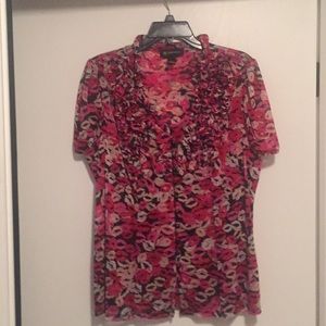 Blouse with lips designed into fabric